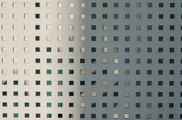In this photo, pattern is portrayed  due to the identical squares that are the same distance away from each other, and same size.
